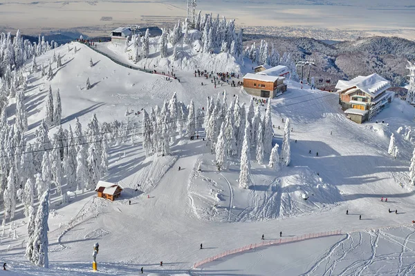 Panoramic view over the ski slope Poiana Brasov ski resort in Tr