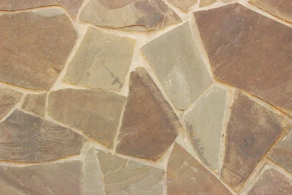Beautiful stonework from coarse natural material in light brown tones
