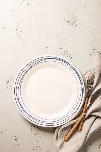 Empty White Plate Napkin Cutlery Grey Stone Background Composition Captured — Stock Photo, Image