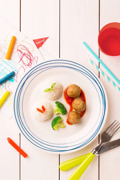 Kid's meal (dinner) - meatballs, rice and broccoli — Stock Photo, Image