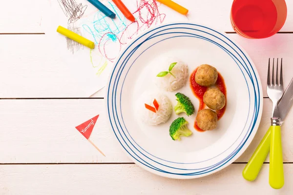 Kid's meal (dinner) - meatballs, rice and broccoli — Stock Photo, Image