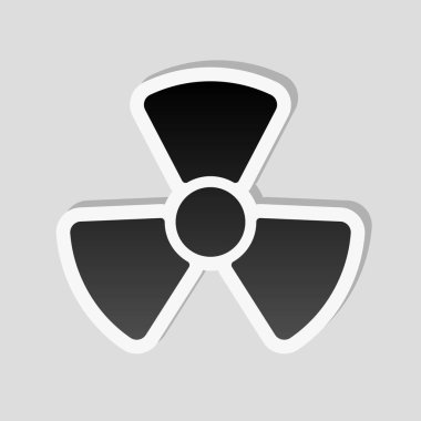 Radyasyon basit sembol. Radyoaktivite simgesi. Etiket tarzı ile beyaz ve gri arka plan üzerinde basit gölge
