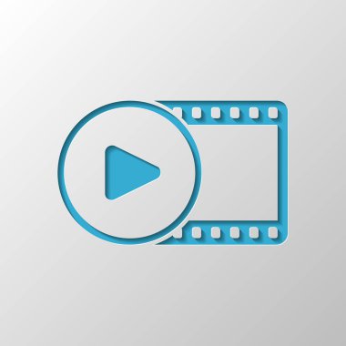 Film şeridi daire içinde oyun simgesiyle. basit siluet. Kağıt tasarımı. Gölge ile düzenlenen sembolü