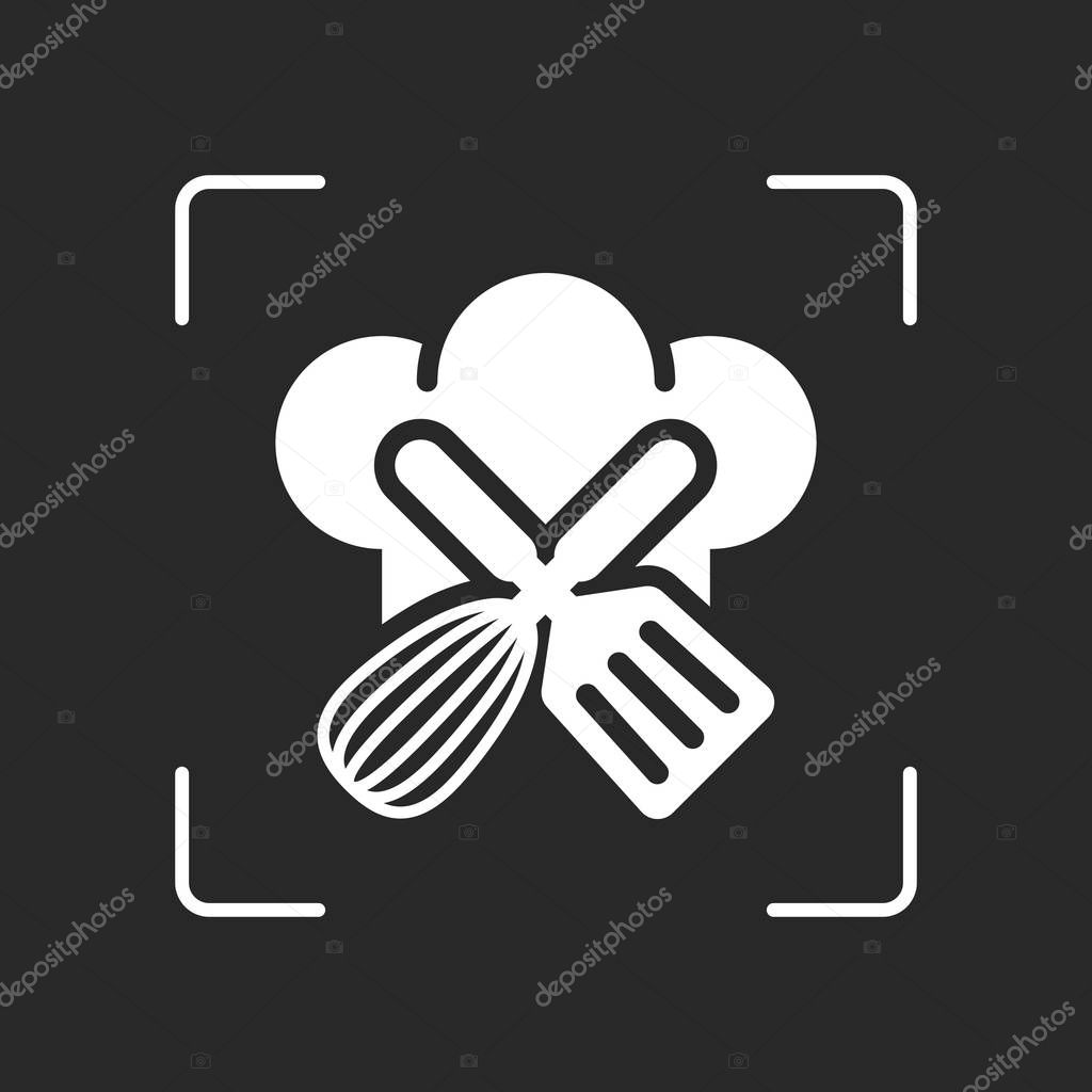 Chef hat and tools. Kitchen logo, simple icon. White object in camera autofocus on dark background