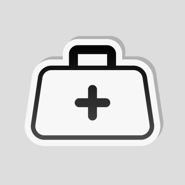 ilk yardım çantası, anahat simgesi. Etiket tarzı ile beyaz ve gri arka plan üzerinde basit gölge