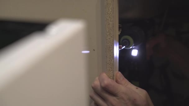 Screwing The Screw Into The Table Surface With A Screwdriver Screwdriver Highlights The Place Of Twisting Close Up