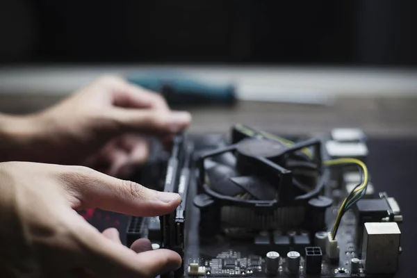 Computer repair and maintenance, Technician is fixing computer a