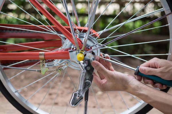 Checking bicycle brake, person is fixing the bicycle brake, Close-up