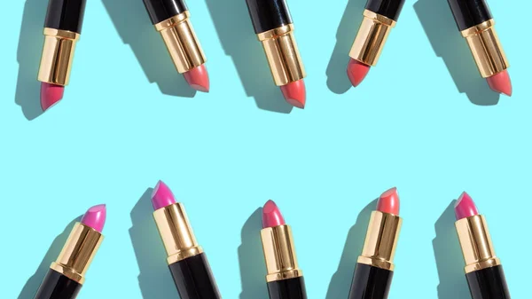 Set of color lipsticks on color background. Flat composition beauty, fashion. flat lay, top view