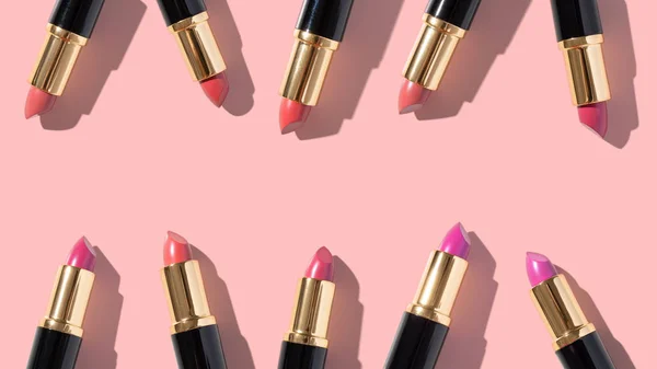 Set of color lipsticks on color background. Flat composition beauty, fashion. flat lay, top view