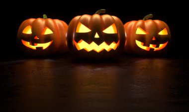 Karanlık arka planda üç jack-o-fener. 3d Rendering illüstrasyon