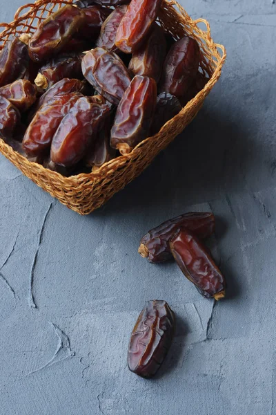 dates fruits on a gray background