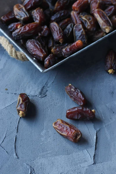 dates fruits on a gray background