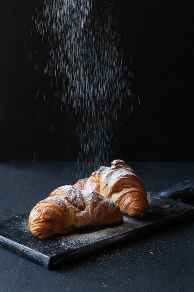 Croissant on a black background