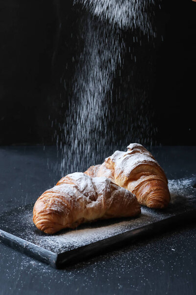 Croissant on a black background