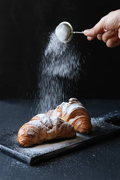 Croissant on a black background