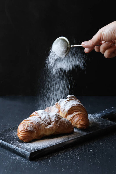 Croissant on a black background