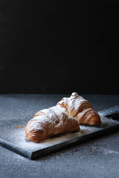 Croissant on a black background