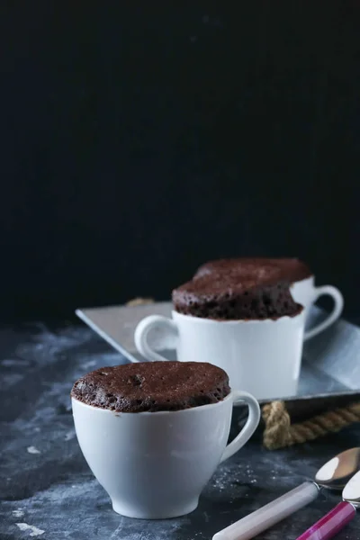 Mug cake on a black background