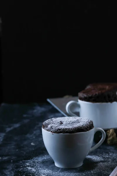 Mug cake on a black background
