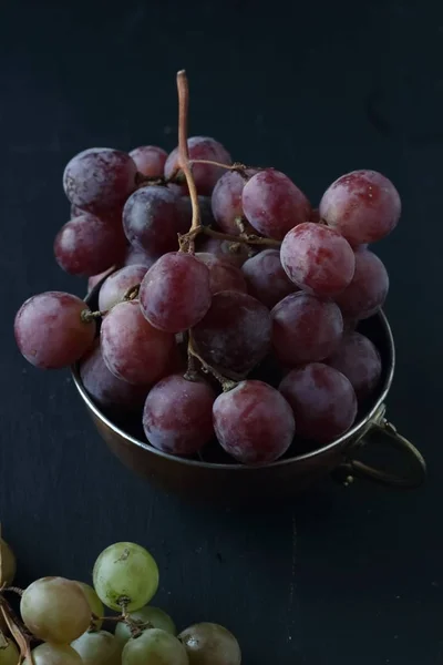 Grape fruits on a black background