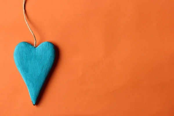 Wooden Blue Heart Orange Background — Stock Photo, Image