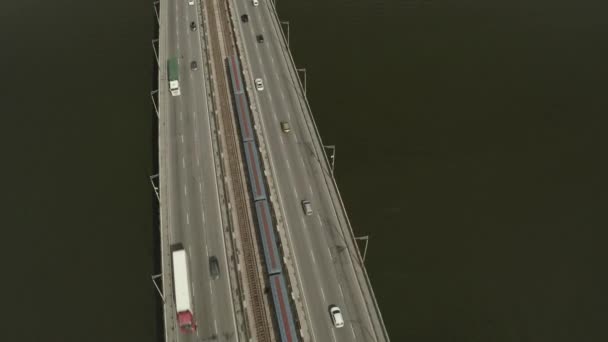 Aerial Shot Drone View Metro Train Passes Bridge Camera Moves — Vídeos de Stock