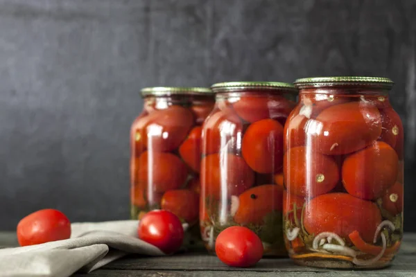 Homemade pickled cherry tomato in jar. Selective focus