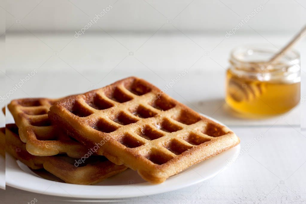 Viennese and Belgian waffles with honey