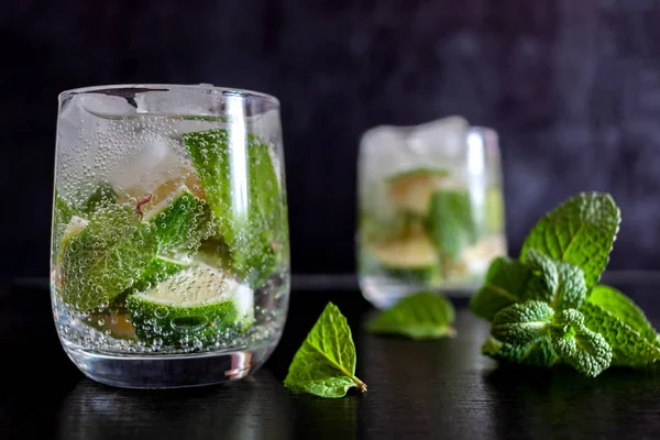 Ice soft drink mojito with lime and mint