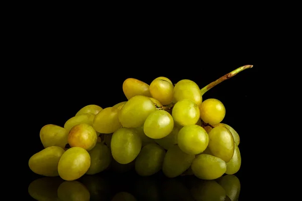 A bunch of grapes on a table of glass on a black background — Stock Photo, Image