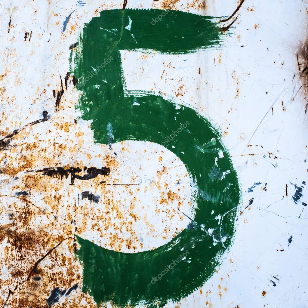 Close-up number 5 handwritten, solid color green painting on rusty metal surface.