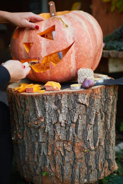 Young Fair Skinned Girl Red Nails Carving Face Pumpkin Creating — Stock Photo, Image