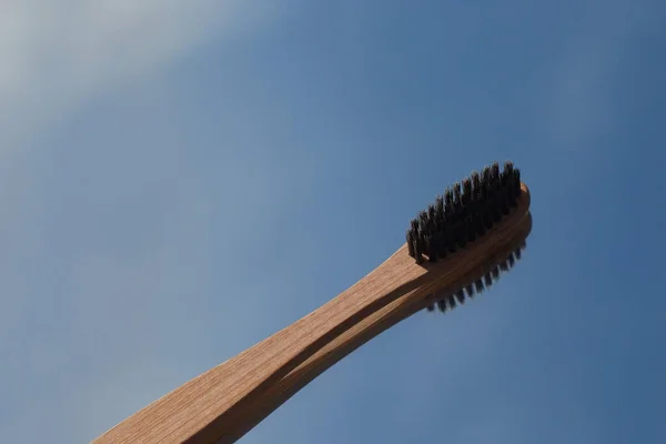 Dark Bamboo Toothbrushes Reflected Mirror Blue Sky Oral Cavity Care — Stock Photo, Image