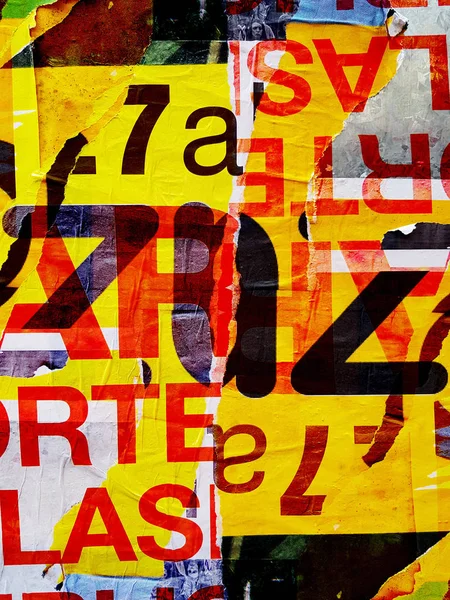 Typographic texture of torn paper signs — Stock Photo, Image