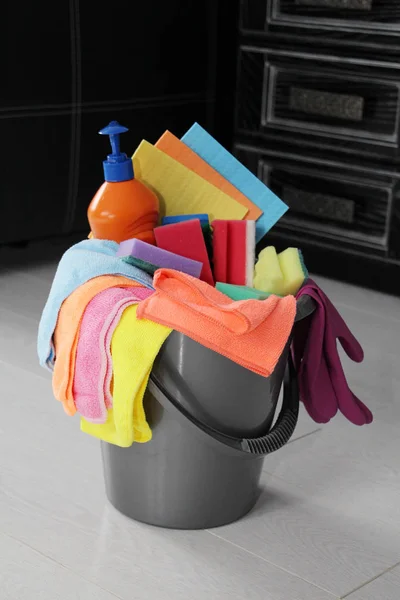 Housekeeping - houses, apartments and offices. Bucket with cleaning products for cleaning.