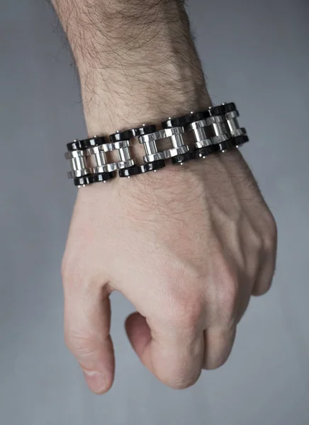 Steel bracelet for men. Decoration on hand for brutal men.