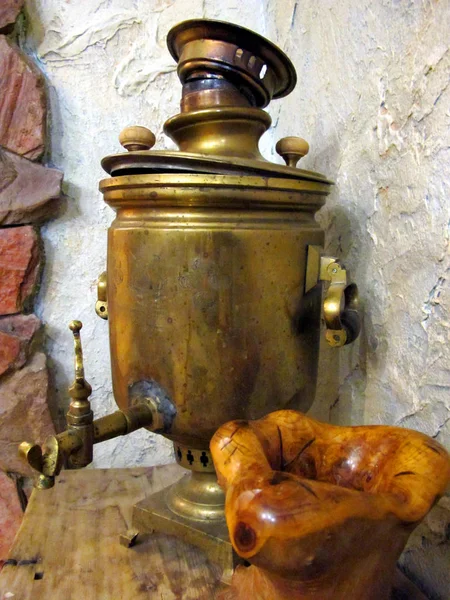Copper antique samovar, in Russian style. It is in the old Russian house.