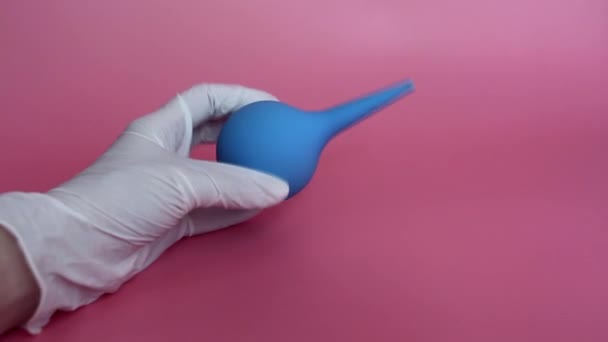 Blue Syringe Soft Tip Hand Hand Latex Gloves Pink Background — Stock Video