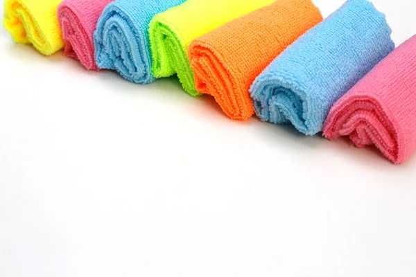 A set of multi-colored microfiber cloths for cleaning. Cleaning services. Cleaning of premises. Housekeeper. A set of bright microfiber napkins for home cleaning.