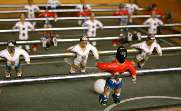 Close view of tiny figures of table football