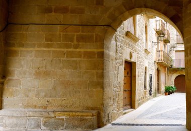 Cozy entrance to courtyard of Calaceite village, Teruel province, Aragon, Spain clipart