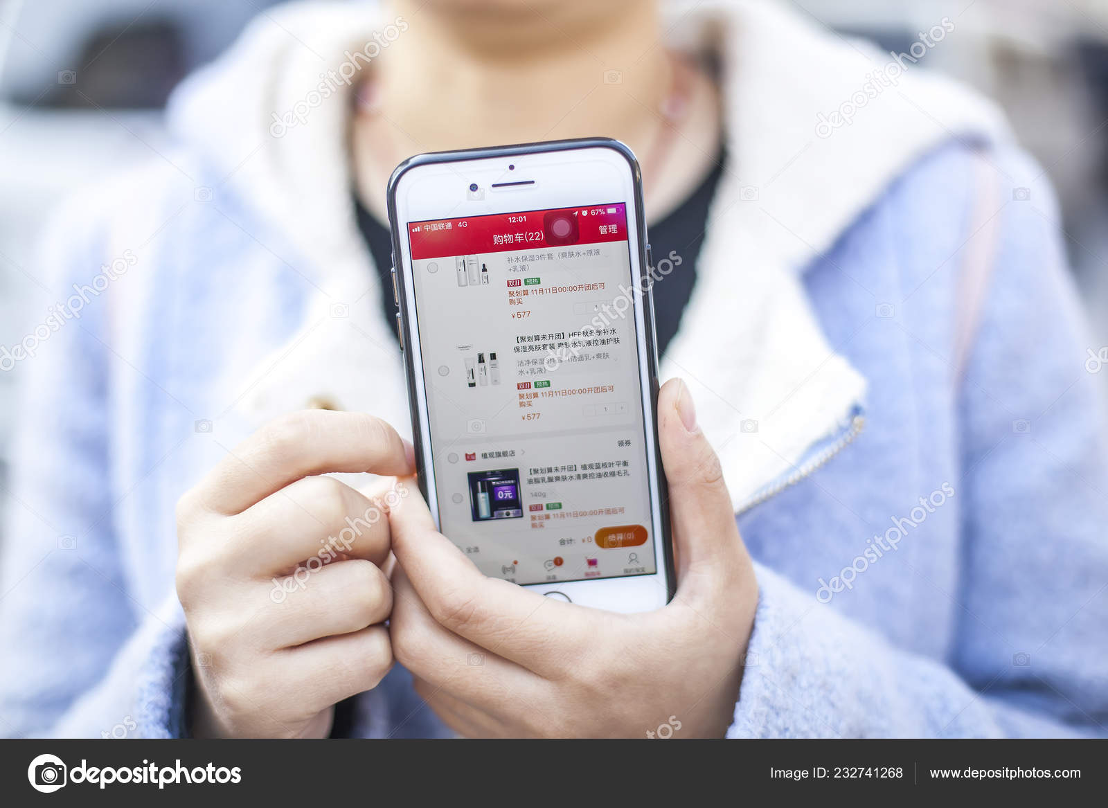 Chinese Mobile Phone User Shows Items Added Shopping Cart Online