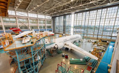 A China's domestically-developed regional ARJ21 jetliner of newly approved airline company Genghis Khan Airlines is seen at a hangar of COMAC (Commercial Aircraft Corporation of China) in Beijing, China, 15 October 2018 clipart