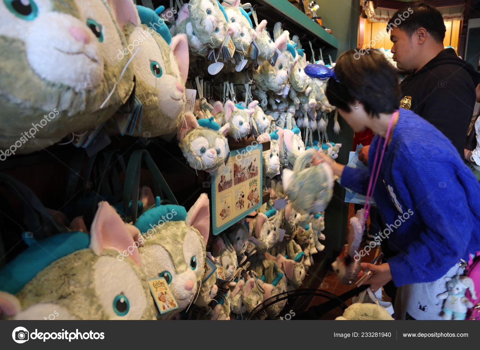 Chinese fans shop for peripheral products at a franchised store of