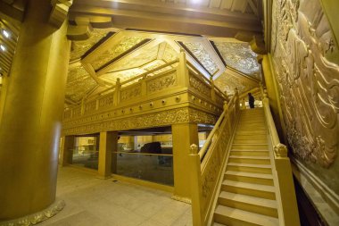 Interior view of the Buddhism Pure Copper Palace with a lying Buddha in it at Taiyuan Longquan Temple in Taiyuan city, north China's Shanxi province, 7 December 2018 clipart
