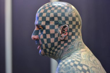 American freakshow guest star Matt Gone poses during the Tattoo Show 2018 in Hangzhou city, east China's Zhejiang province, 21 October 2018 clipart