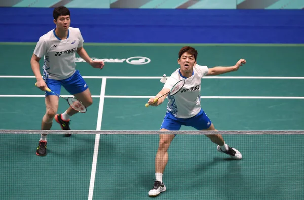 ムヒョンと韓国の李容 Dae 成鉉と韓国の新ペク ヨンチョル男子ダブルスの決勝戦において Hsbc Bwf 世界大会中にツアー マカオ オープン バドミントン — ストック写真