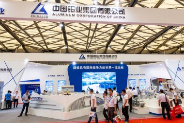 People visit the stand of China State Shipbuilding Corp. (CSSC) during an expo in Shanghai, China, 14 June 2018 clipart