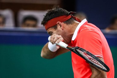 Juan Martin Del Potro of Argentina reacts as he competes against Borna Coric of Croatia in their third round match of the men's singles during the Rolex Shanghai Masters 2018 tennis tournament in Shanghai, China, 11 October 2018. 